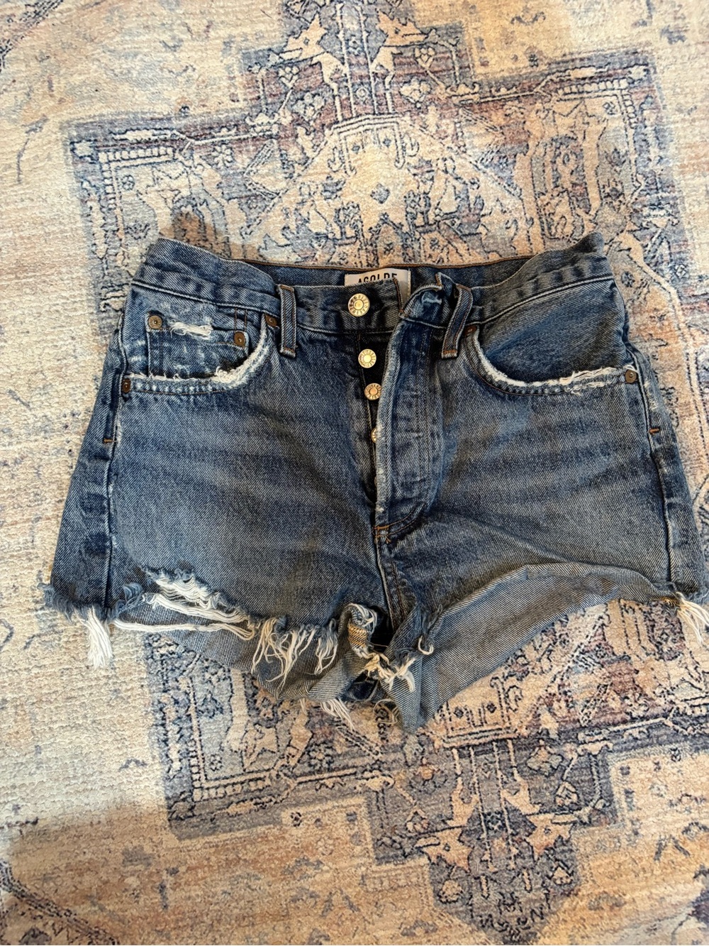 Agolde Distressed High-Rise Denim Cutoff Shorts in Dark Blue